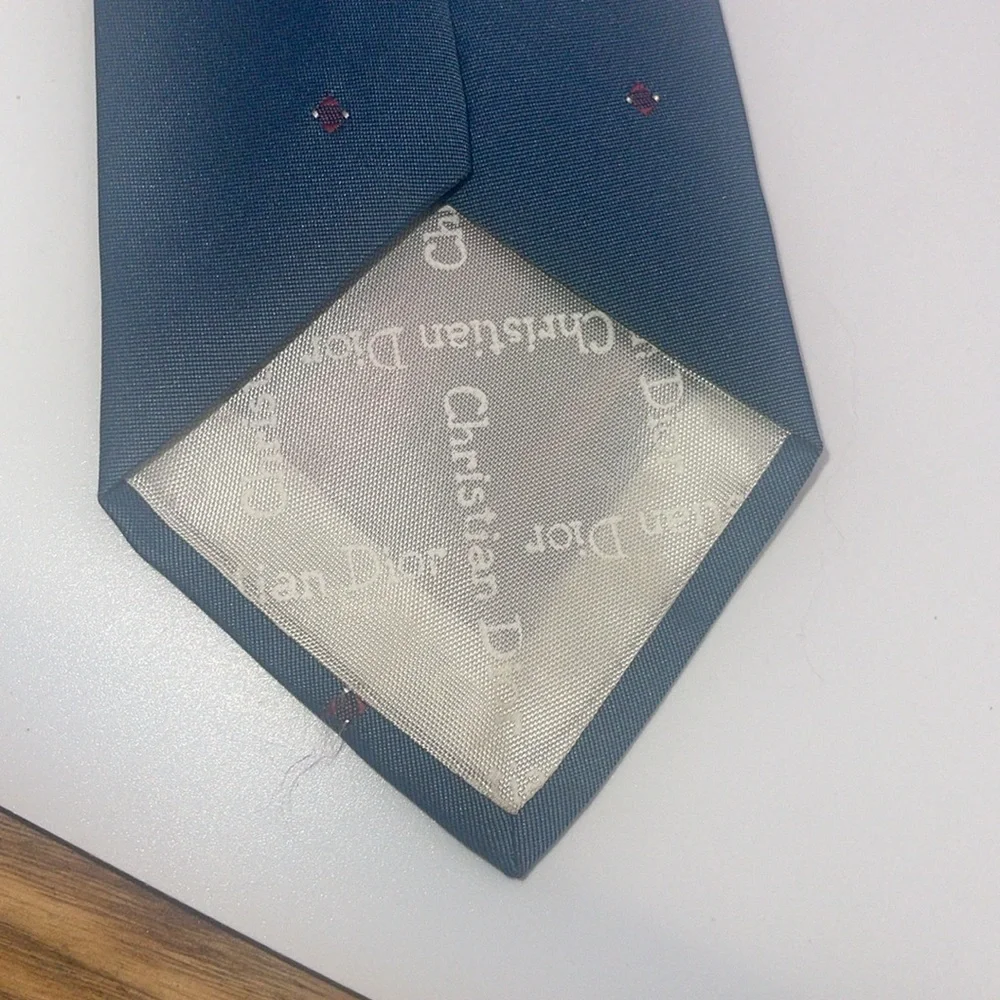 Christian Dior men’s tie. Polyester/silk blend.
